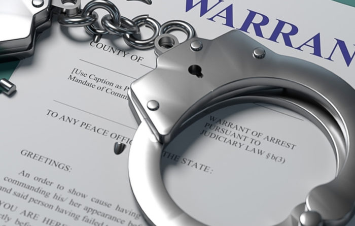Do warrants show up on background checks?