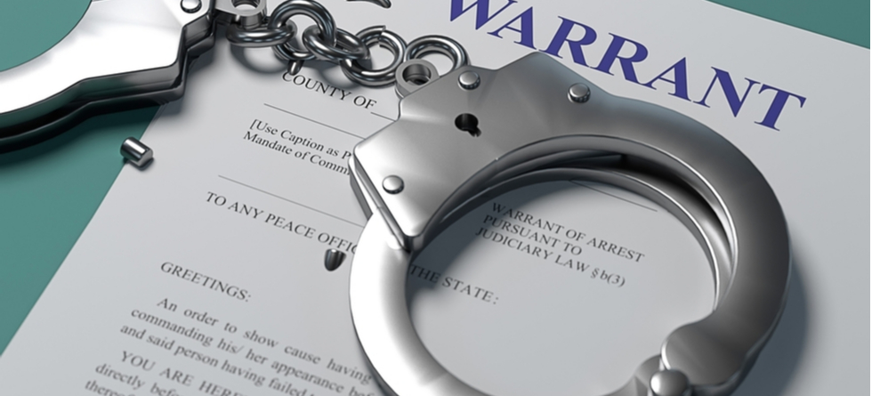 Do warrants show up on background checks?